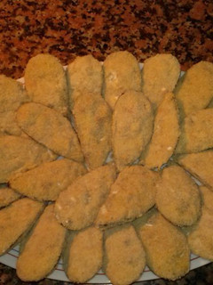 Una foto de Mejillones rellenos de bechamel