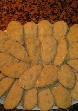 Una foto de Mejillones rellenos de bechamel