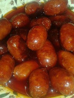 Una foto de Chorizos picantes en salsa de sidra