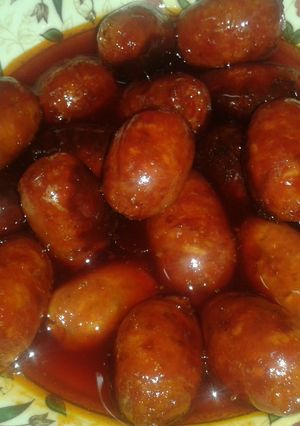 Una foto de Chorizos picantes en salsa de sidra