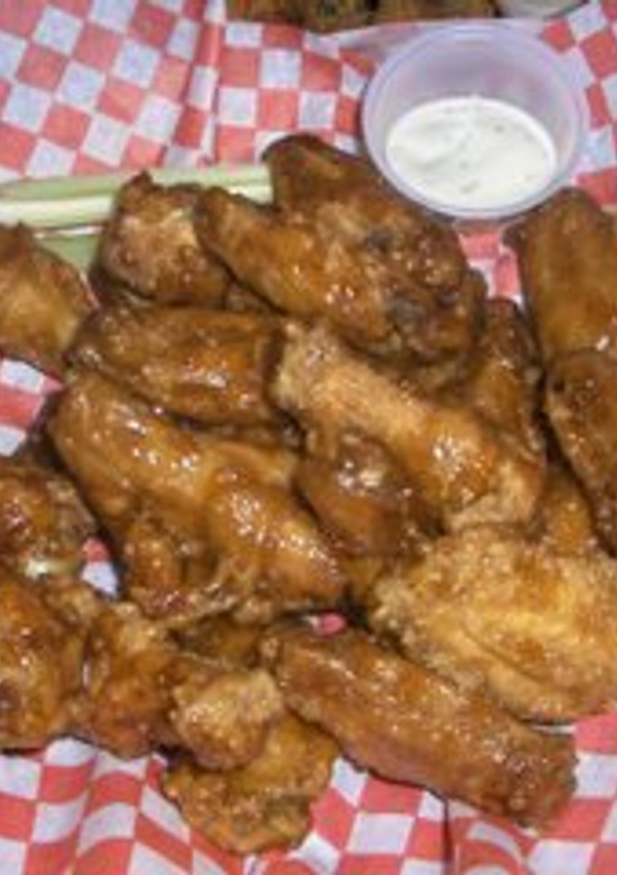 Una foto de Alitas de pollo con miel y ajo 