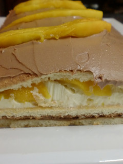 Foto principal de Bizcocho de buttercream con mango y Nutella