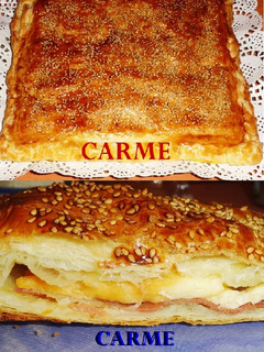Una foto de Jamón serrano con queso curado y miel en hojaldre
