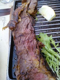 Una foto de Asado a la cruz de vacio de vaca