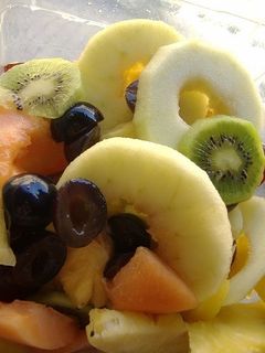 Una foto de Piña con Frutas al Cointreau