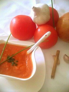 Una foto de Sofrito de tomate y cebolla
