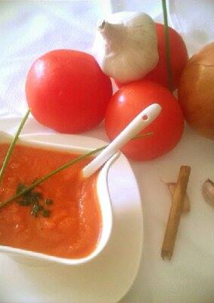 Una foto de Sofrito de tomate y cebolla