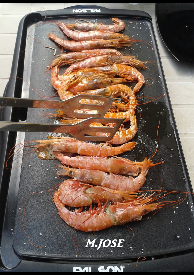Una foto de Langostinos plancha