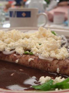 Una foto de Enfrijoladas estilo Dely