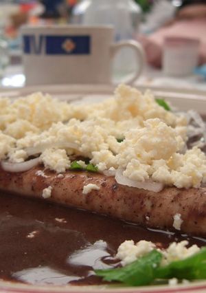 Una foto de Enfrijoladas estilo Dely