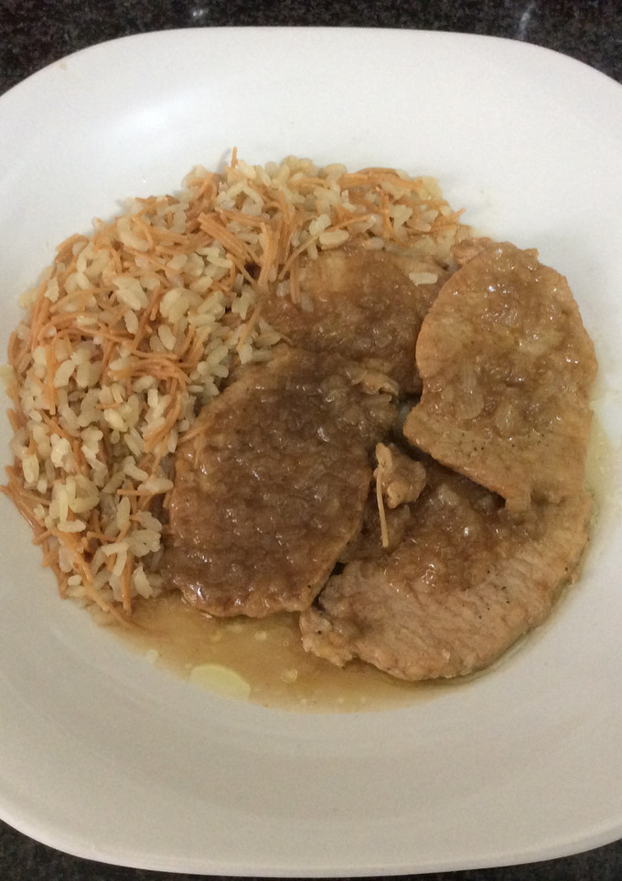 Una foto de Lomo de cerdo con cebolla caramelizada AMC