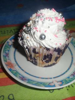Una foto de Cupcakes de vainilla y crema