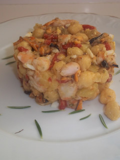 Una foto de Garbanzos y mariscos en molde