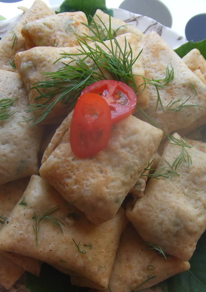 Una foto de Paquetitos de crêpes rellenos