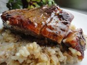 Una foto de arroz con magret de pato
