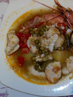 Una foto de Guiso de merluza y gambón