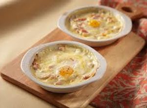 Una foto de Huevos con Jamón & Queso al Horno