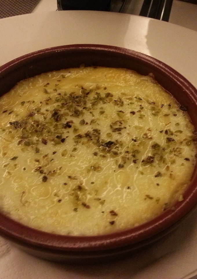 Una foto de Provolone con Orégano