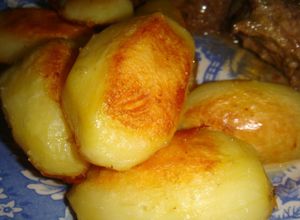 Una foto de Papas doradas al horno perfectas