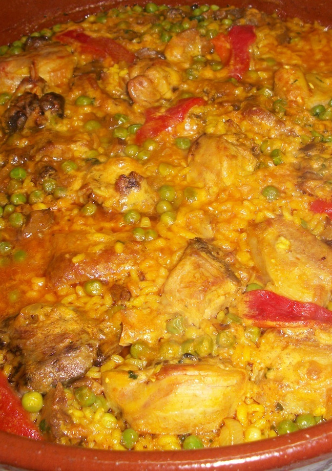 Una foto de Arroz con setas y conejo de monte