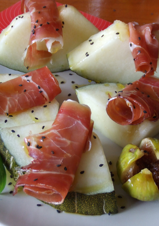 Una foto de Melón con jamón de Parma e higos