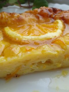 Una foto de Portokalopita o pastel griego de naranja