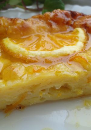 Una foto de Portokalopita o pastel griego de naranja