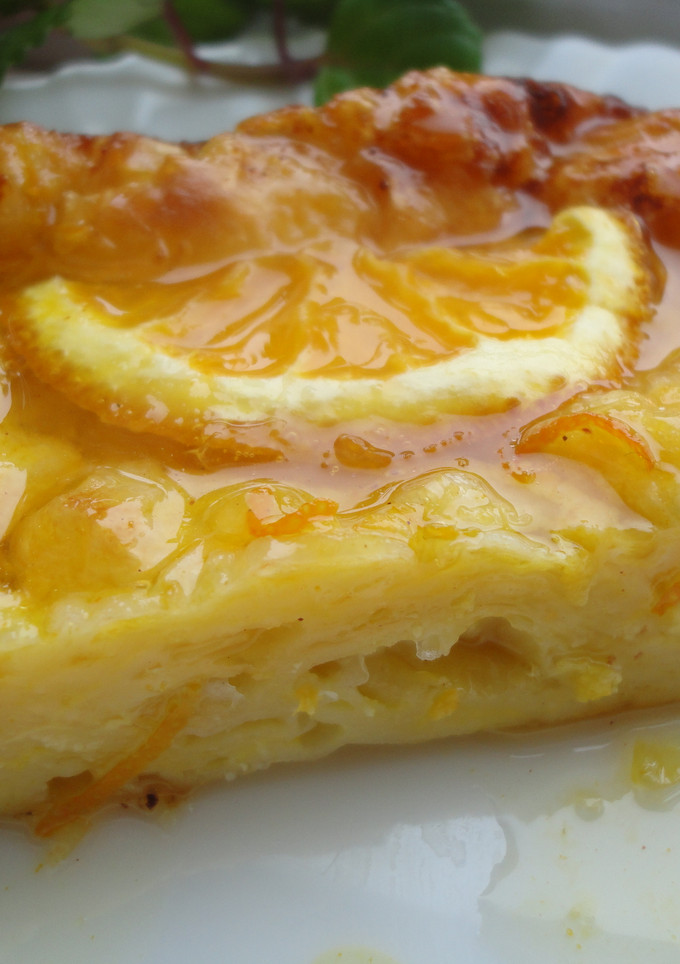 Una foto de Portokalopita o pastel griego de naranja