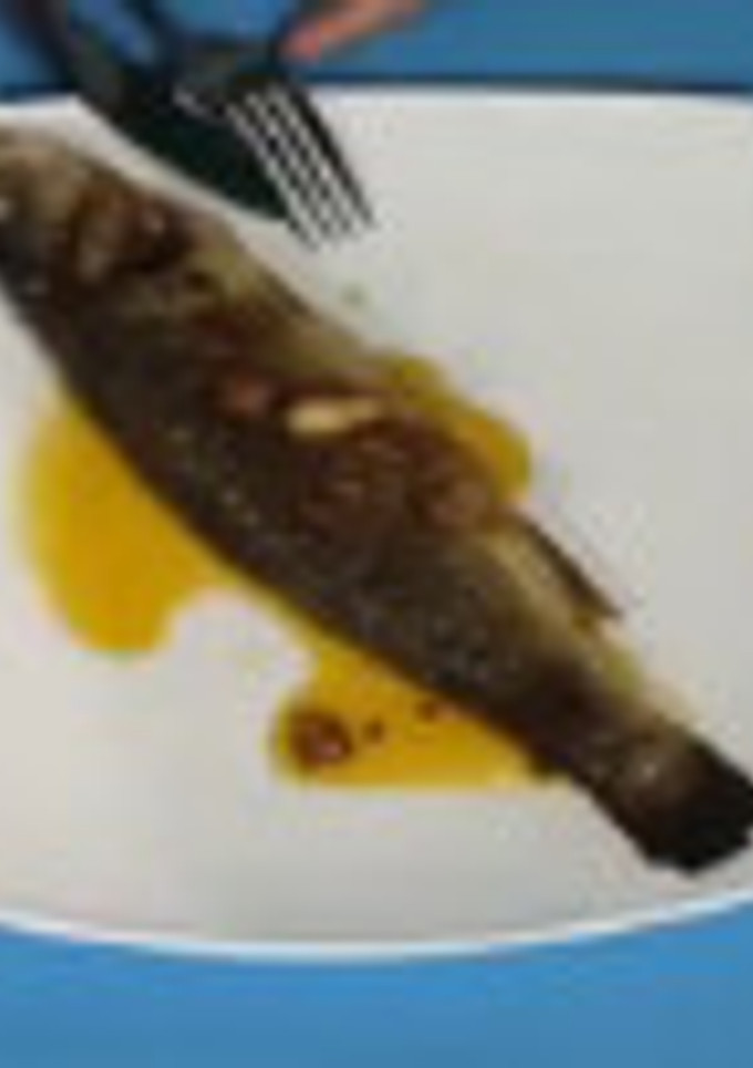 Una foto de Lubina al horno