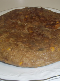 Una foto de Tortilla de alcachofas y maíz