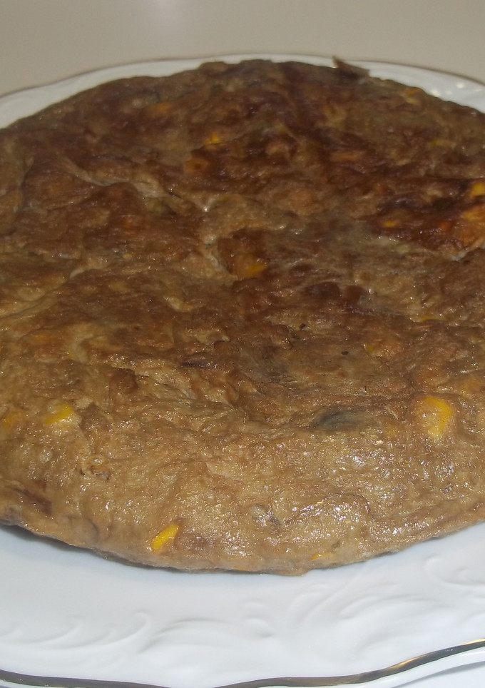 Una foto de Tortilla de alcachofas y maíz