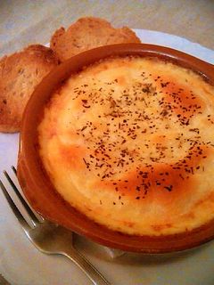 Una foto de Provolone con salsa boloñesa