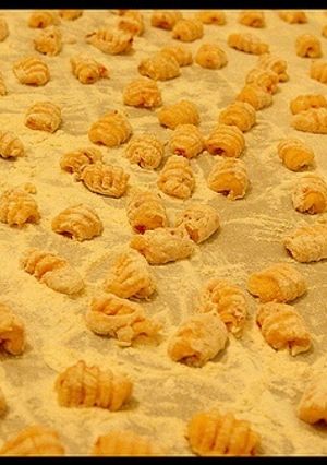 Una foto de Ñoquis a la bechamel y nuez moscada