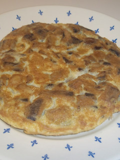 Una foto de Tortilla de esclatasangs y champiñones