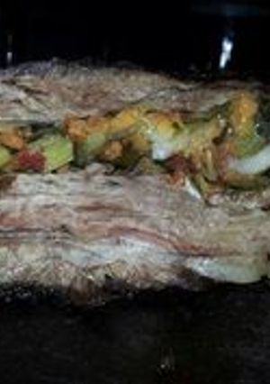 Una foto de Asado a la parrilla de vacío relleno al champiñón