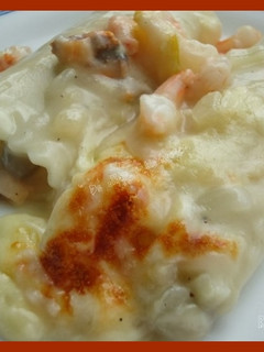 Una foto de Canelones con marisco