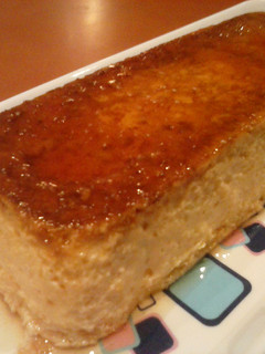 Una foto de Flan con mandarina