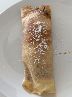 Una foto de Panqueques con dulce de leche y banana