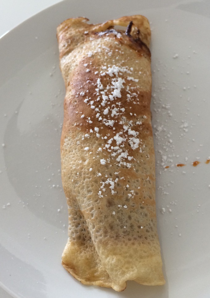 Una foto de Panqueques con dulce de leche y banana