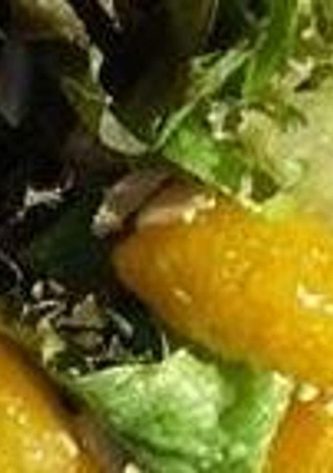 Una foto de Ensalada tibia de naranjas con almendras