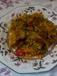 Una foto de Arroz con costillejas y pimientos de piquillo