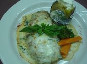 Una foto de corvina con camarones