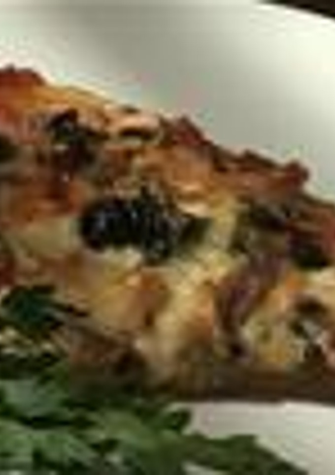 Una foto de Pizza cuatro estaciones