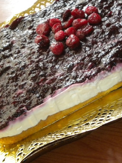 Una foto de Tarta de queso y arándanos