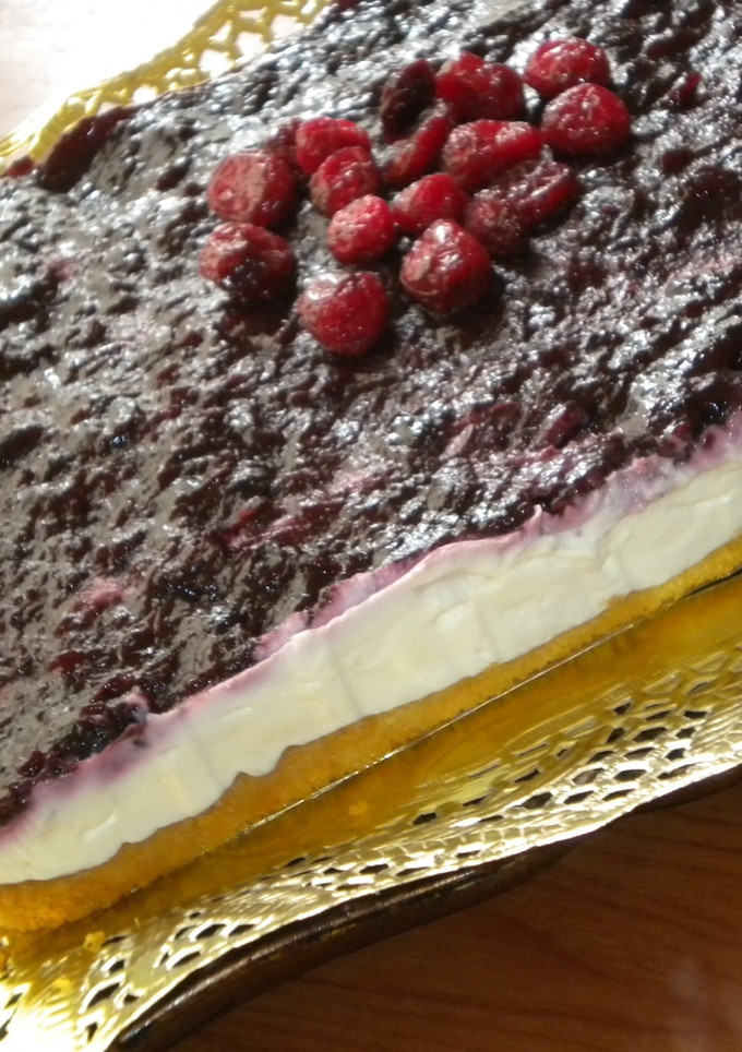 Una foto de Tarta de queso y arándanos