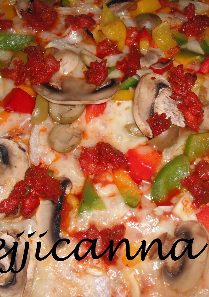 Una foto de Pizza vegetariana