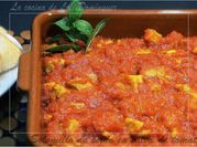Una foto de solomillo de cerdo con tomate