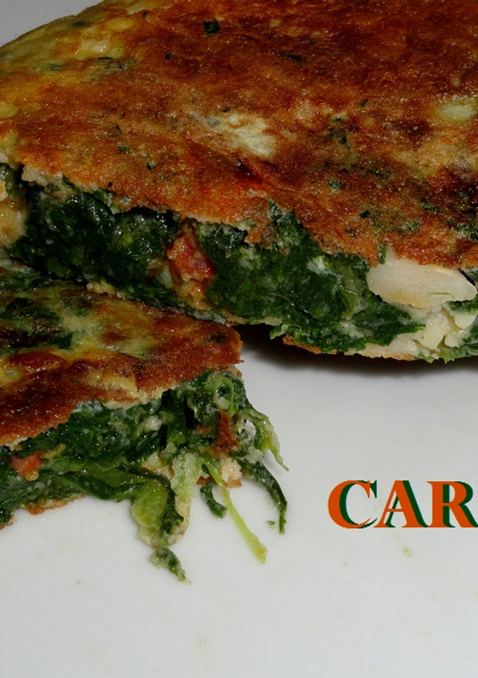 Una foto de Tortilla de acelgas y alubias con chorizo