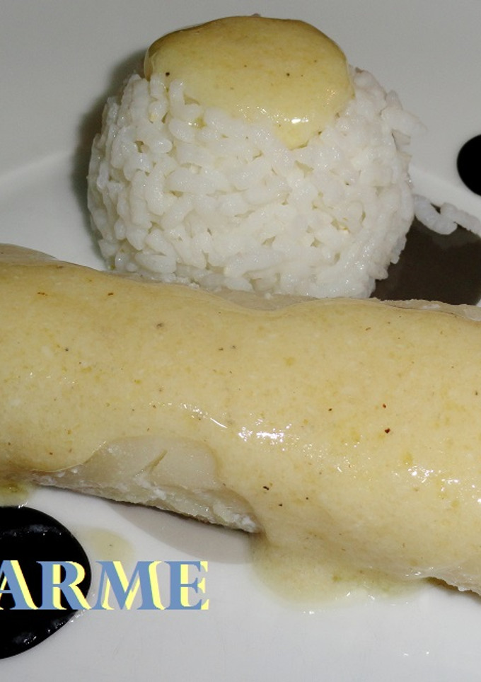 Una foto de Bacalao confitado con salsa blanca