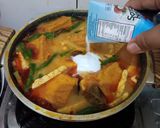 Foto langkah ke 6 dari resep Ketupat sayur labu siam santan.